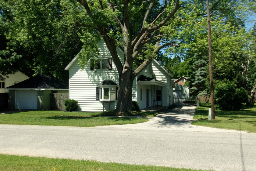 This home is waiting for that growing family with over 2500 sq - Beach Home for sale in Manistee, Michigan on Beachhouse.com