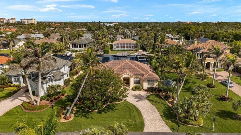 Situated in the sought-after gated waterfront community of - Beach Home for sale in Fort Myers, Florida on Beachhouse.com