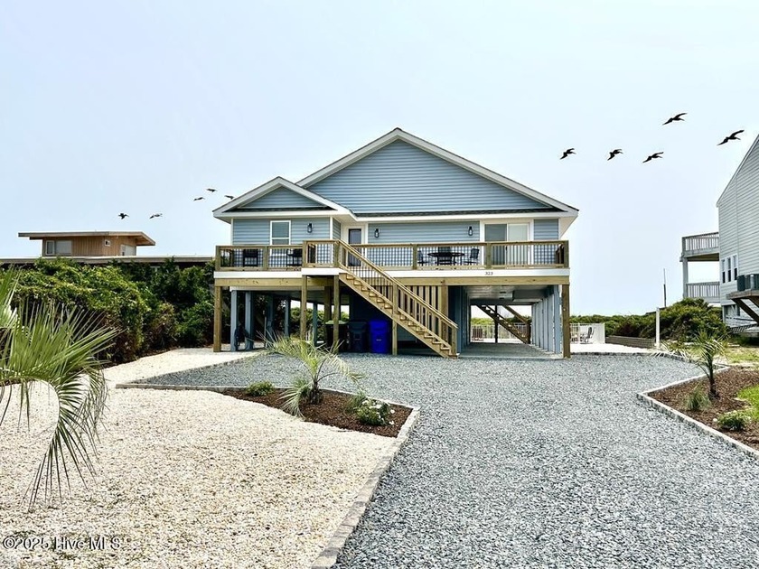 This absolutely gorgeous home has been recently renovated inside - Beach Home for sale in Oak Island, North Carolina on Beachhouse.com