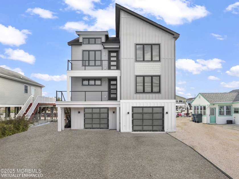 Experience modern coastal luxury in this brand-new, custom-built - Beach Home for sale in Little Egg Harbor, New Jersey on Beachhouse.com
