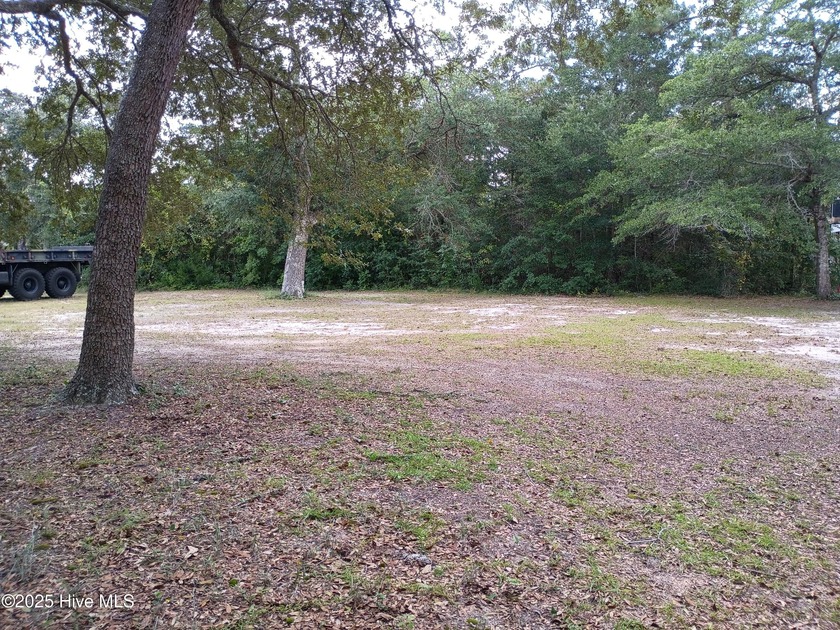 This beautiful .3 acre double lot is located on the quiet West - Beach Lot for sale in Oak Island, North Carolina on Beachhouse.com