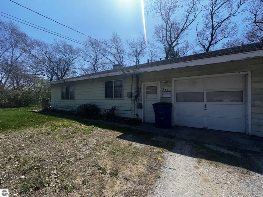 Great Investment Opportunity - Duplex w/ Attached Garages - - Beach Lot for sale in Oscoda, Michigan on Beachhouse.com
