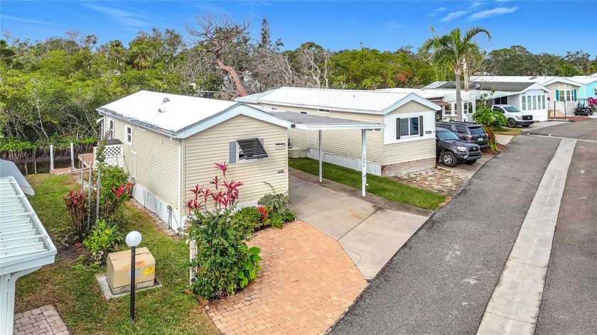 PRICE REDUCED! This FULLY FURNISHED home with HURRICANE IMPACT - Beach Home for sale in Bradenton, Florida on Beachhouse.com