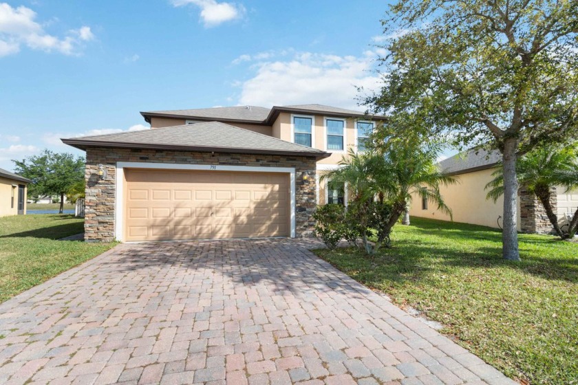 This lakefront property offers a beautiful saltwater pool home - Beach Home for sale in Palm Bay, Florida on Beachhouse.com