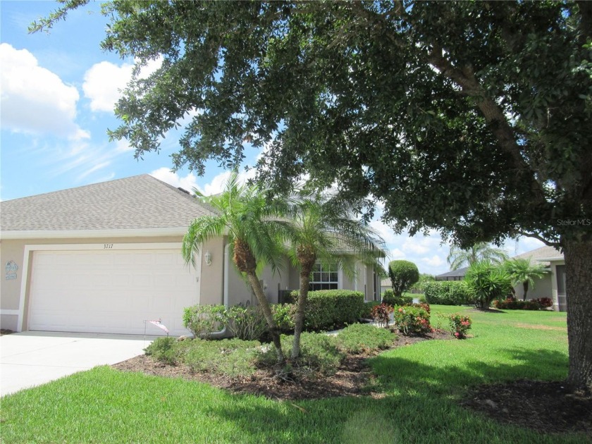 A 2/3 bedroom, 2 bath villa with wonderful lake views and a - Beach Home for sale in North Port, Florida on Beachhouse.com