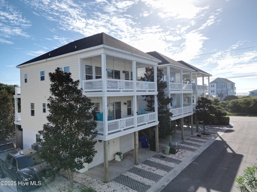 Situated a short walk from the beach, this 4-bedroom, 3-bath - Beach Home for sale in Surf City, North Carolina on Beachhouse.com