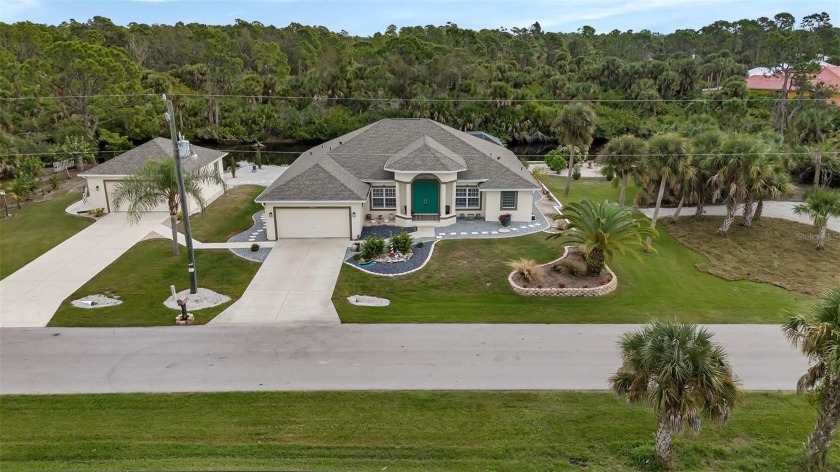 Luxury, Land, Location. This luxurious estate home, sits on 3 - Beach Home for sale in Port Charlotte, Florida on Beachhouse.com
