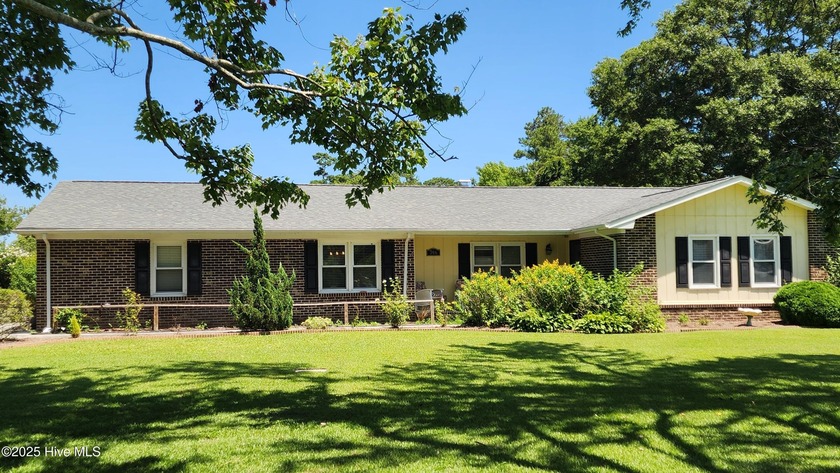 One level living at it's finest! This brick three bedroom, two - Beach Home for sale in Morehead City, North Carolina on Beachhouse.com