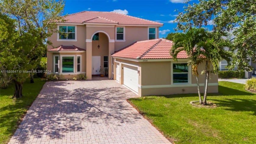 BEAUTIFUL HOME WITH 4 BEDROOMS 2.5 BATHS 3 CAR GARAGE, LAKE VIEW - Beach Home for sale in Miramar, Florida on Beachhouse.com