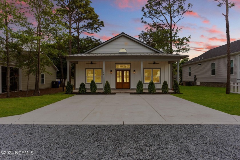 Discover the allure of this charming new construction home - Beach Home for sale in Oak Island, North Carolina on Beachhouse.com