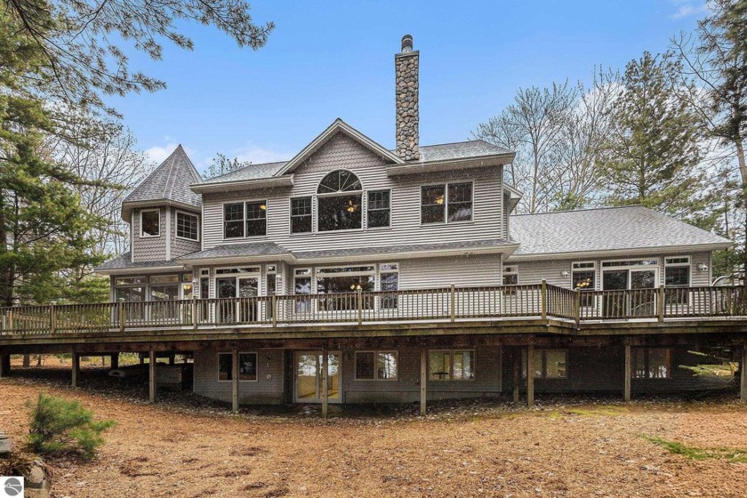 Discover your own piece of paradise with this stunning East Bay - Beach Home for sale in Kewadin, Michigan on Beachhouse.com