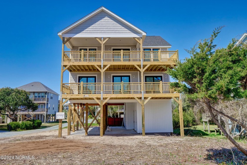 Introducing this exquisite new construction beach home with - Beach Home for sale in Topsail Beach, North Carolina on Beachhouse.com