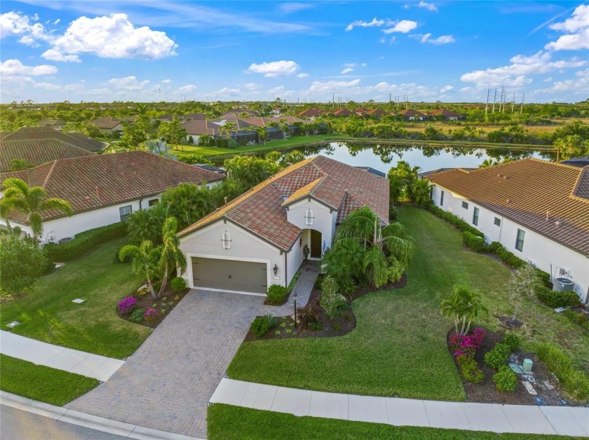 This exquisite residence in the gated Milano community is a true - Beach Home for sale in Nokomis, Florida on Beachhouse.com