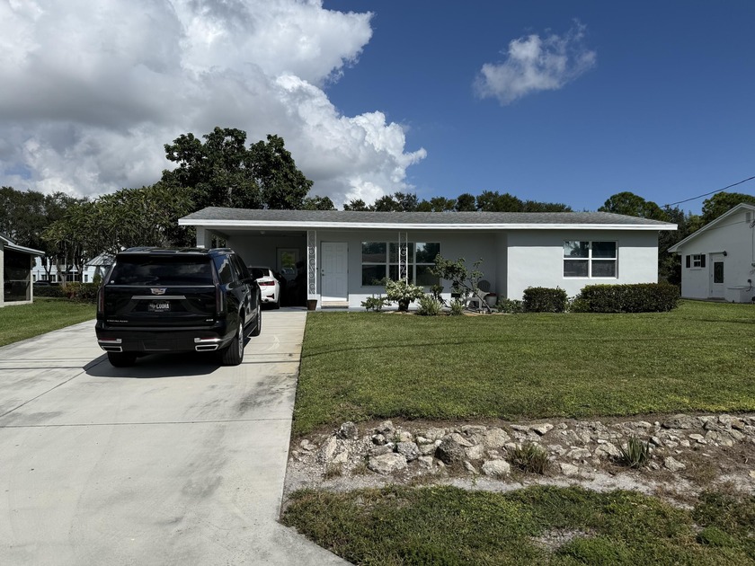 No HOA! Enjoy true Florida living on a navigable canal with - Beach Home for sale in Lake Worth, Florida on Beachhouse.com