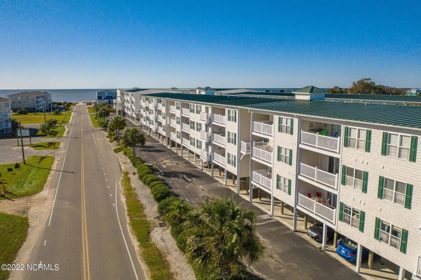 Enjoy ocean views and breezes from your private covered balcony - Beach Condo for sale in Oak Island, North Carolina on Beachhouse.com