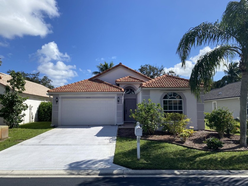 Discover a stunning 3-bedroom, 2-bathroom home with a 2-car - Beach Home for sale in Wellington, Florida on Beachhouse.com