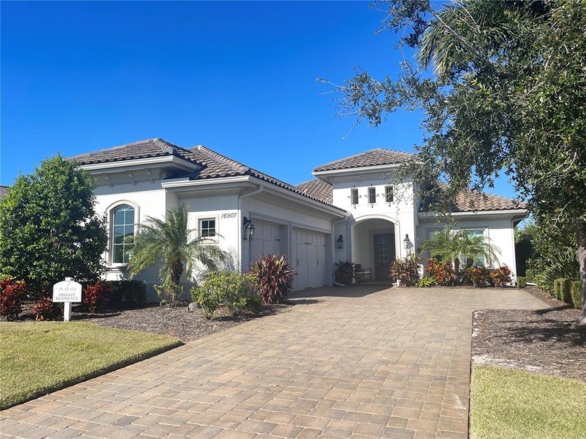 Welcome to this Stunning Birchwood Model Home in the guard-gated - Beach Home for sale in Lakewood Ranch, Florida on Beachhouse.com