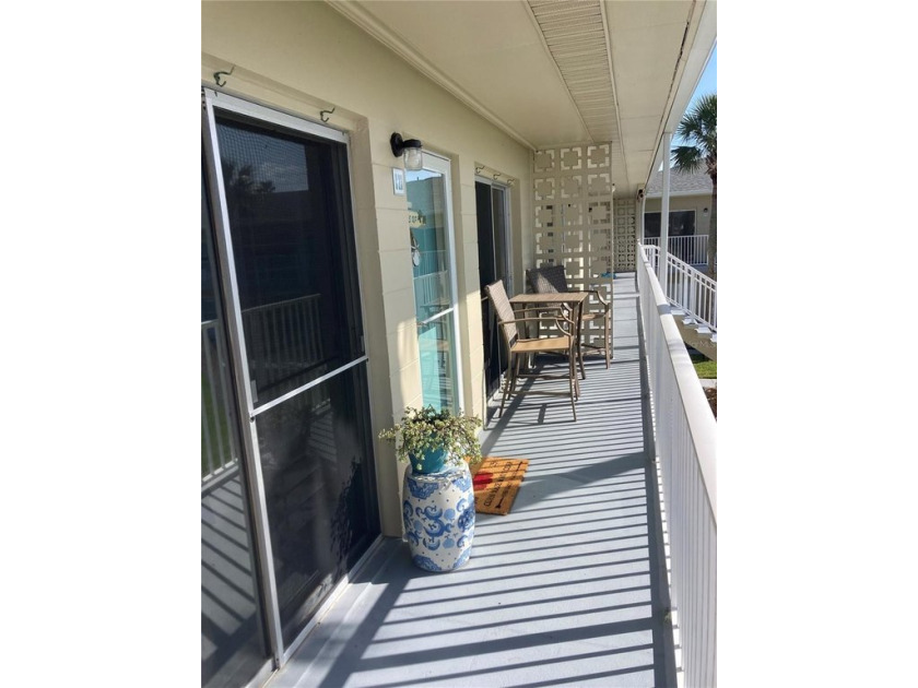 Coastal charm and beautiful renovation await you in this 2nd - Beach Condo for sale in New Smyrna Beach, Florida on Beachhouse.com