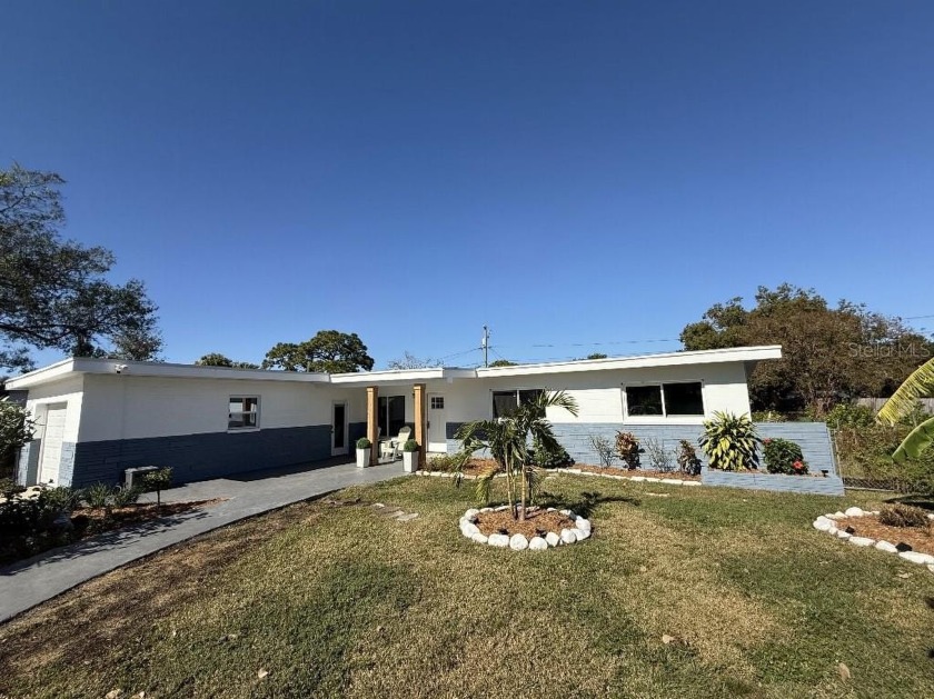 Welcome to 8401 Jacaranda Ave, a stunningly renovated 3-bedroom - Beach Home for sale in Seminole, Florida on Beachhouse.com