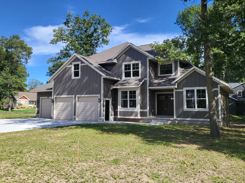 Here's a great opportunity to own a brand new, high quality home - Beach Home for sale in Norton Shores, Michigan on Beachhouse.com