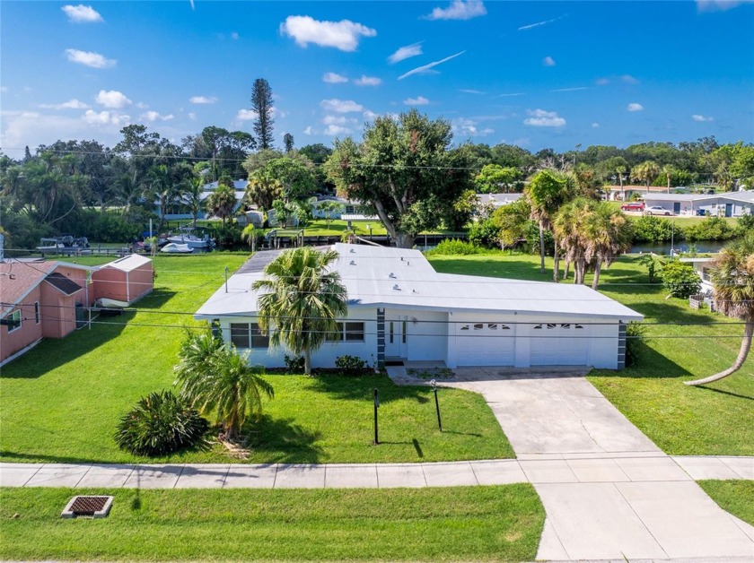 100' canal frontage with boat dock and lift east of 41 just - Beach Home for sale in Nokomis, Florida on Beachhouse.com