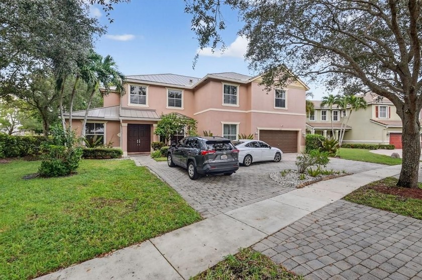 RARE FIND IN SAVANNAH ESTATES! Exceptional 7BR/5BA home on - Beach Home for sale in Lake Worth, Florida on Beachhouse.com
