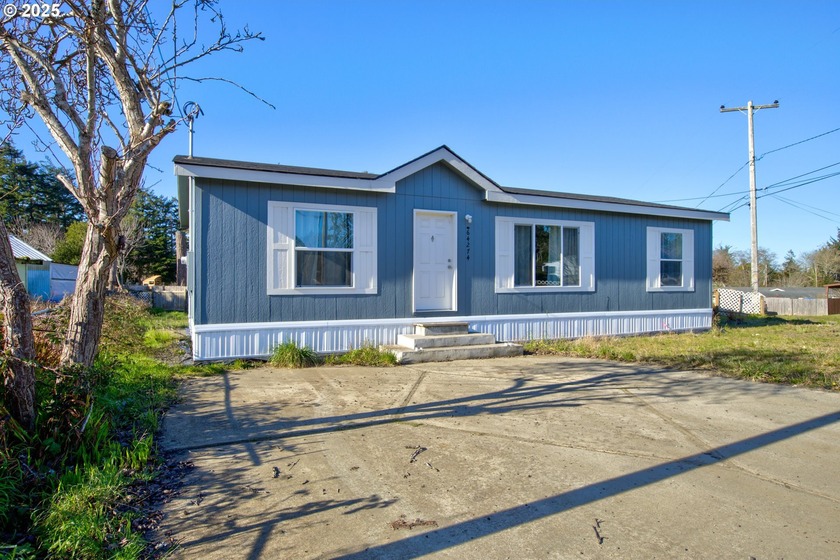 Experience coastal living just minutes from the bay with this - Beach Home for sale in Coos Bay, Oregon on Beachhouse.com