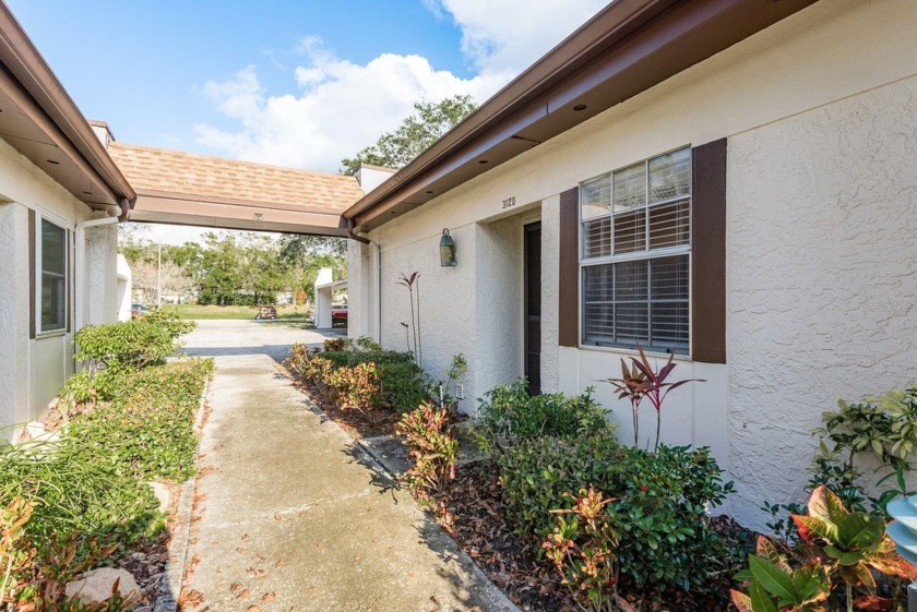 Welcome to Highland Lakes where this beautiful 55+ pristine golf - Beach Condo for sale in Palm Harbor, Florida on Beachhouse.com