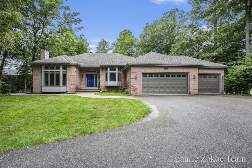 Introducing this executive custom built ranch on a secluded cove - Beach Home for sale in Norton Shores, Michigan on Beachhouse.com