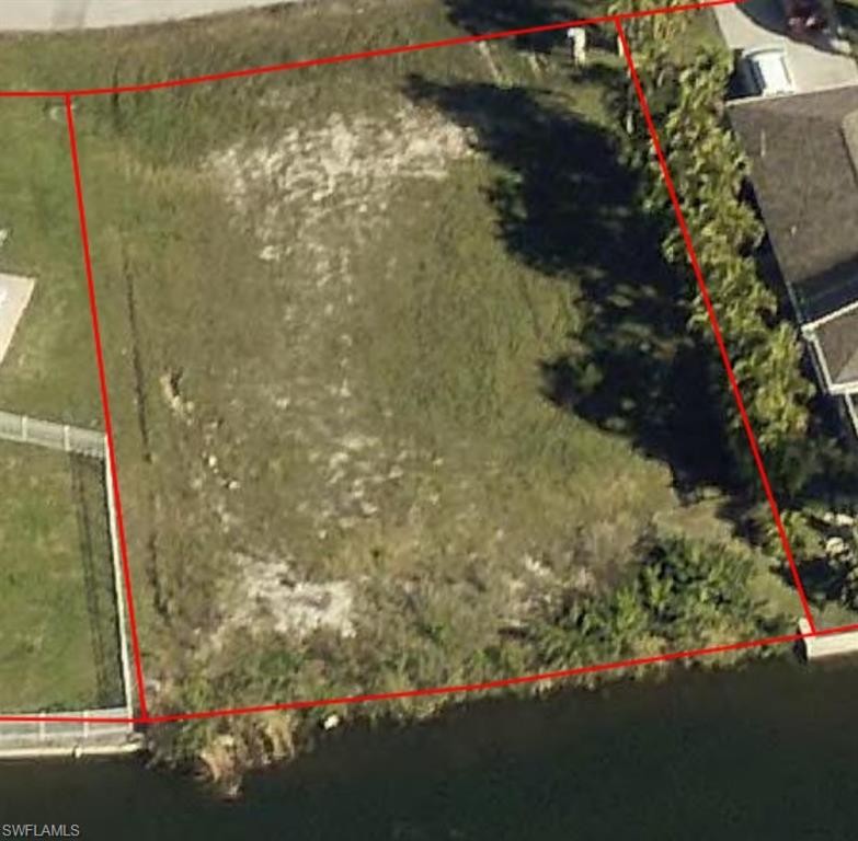 SIGNIFICANT PRICE IMPROVEMENT!! Spectacular is just one word to - Beach Lot for sale in Cape Coral, Florida on Beachhouse.com