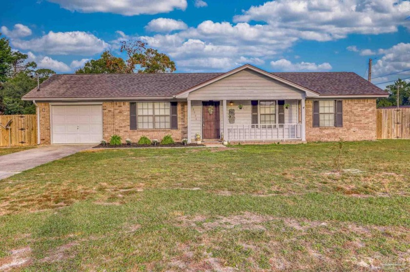 Welcome to 10800 Bridge Creek Drive, a charming brick home in - Beach Home for sale in Pensacola, Florida on Beachhouse.com