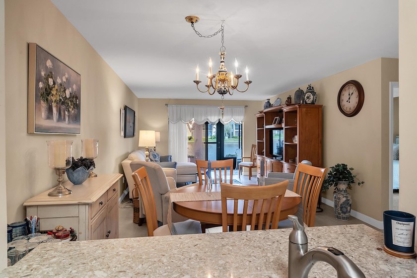 CATCH THE BREEZE AS YOU RELAX IN YOUR ENCLOSED LANAI ON THE LAKE - Beach Condo for sale in Lake Worth, Florida on Beachhouse.com