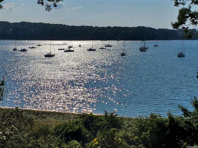 Perched perfectly 30 feet above sea level is this water view gem - Beach Home for sale in Port Jefferson, New York on Beachhouse.com