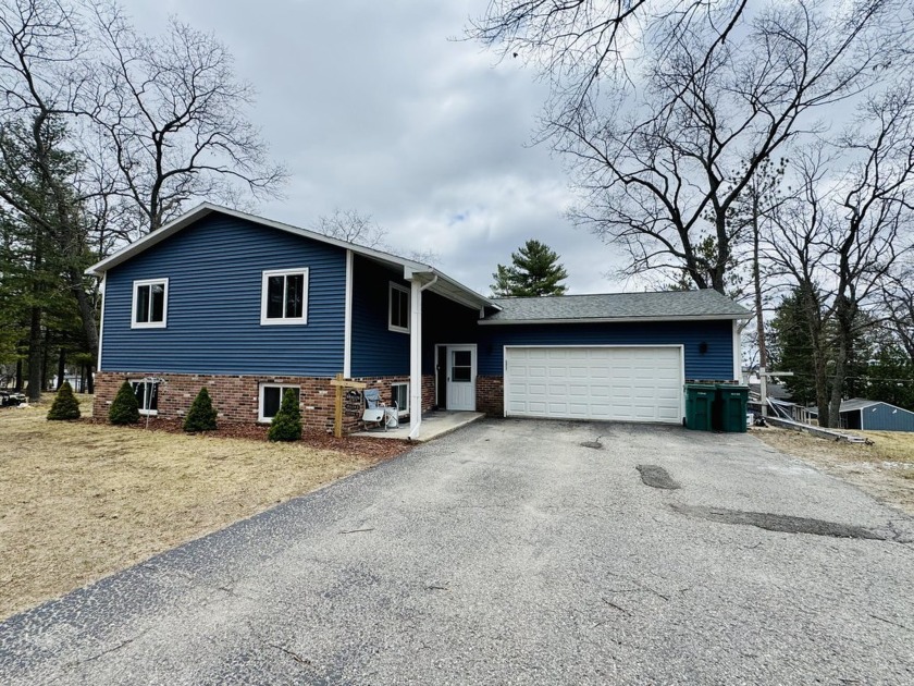 This recently updated large home is located in a quiet - Beach Home for sale in Oscoda, Michigan on Beachhouse.com