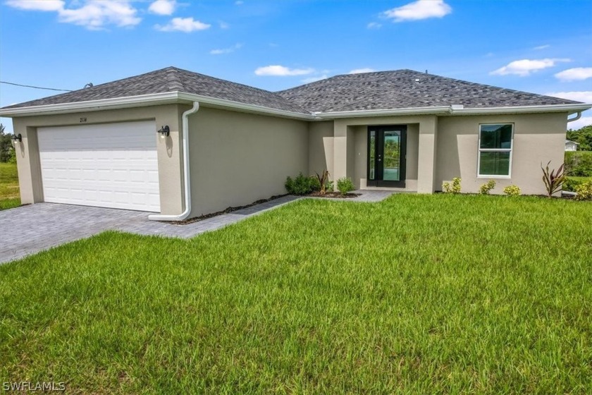 Brand new beautiful 4 bedroom/2 bath concrete block waterfront - Beach Home for sale in Cape Coral, Florida on Beachhouse.com