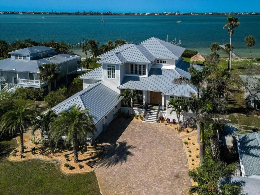 Nestled along the serene shores of Lemon Bay, this stunning - Beach Home for sale in Englewood, Florida on Beachhouse.com
