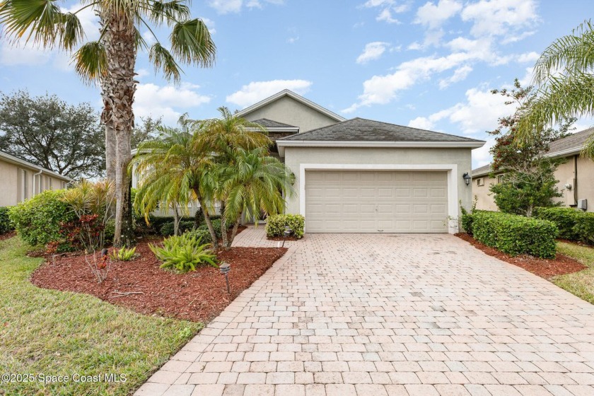 Nestled in the sought-after gated community of Fairway Crossings - Beach Home for sale in Palm Bay, Florida on Beachhouse.com