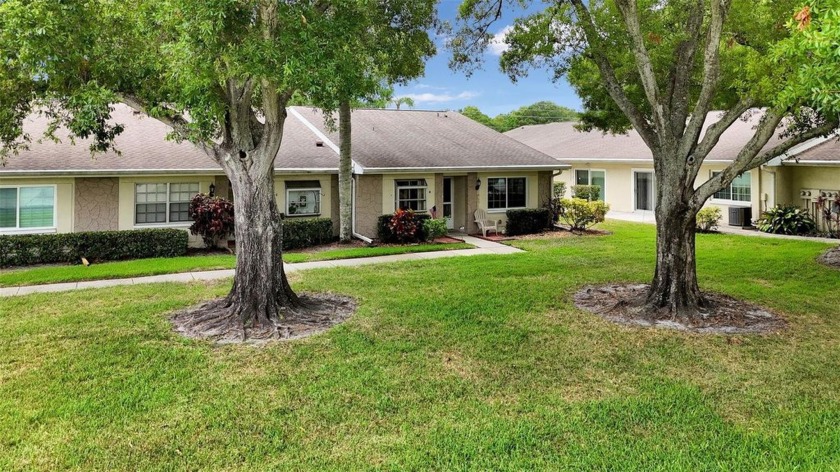 LET'S MAKE A DEAL! PRICED WELL BELOW VALUE in the highly - Beach Home for sale in Palm Harbor, Florida on Beachhouse.com