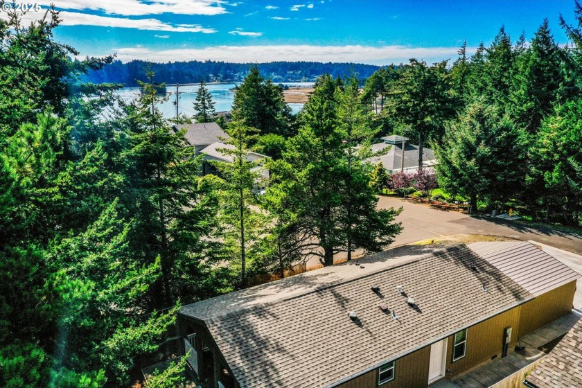 Step into this charming 2024-built home, offering modern living - Beach Home for sale in Florence, Oregon on Beachhouse.com