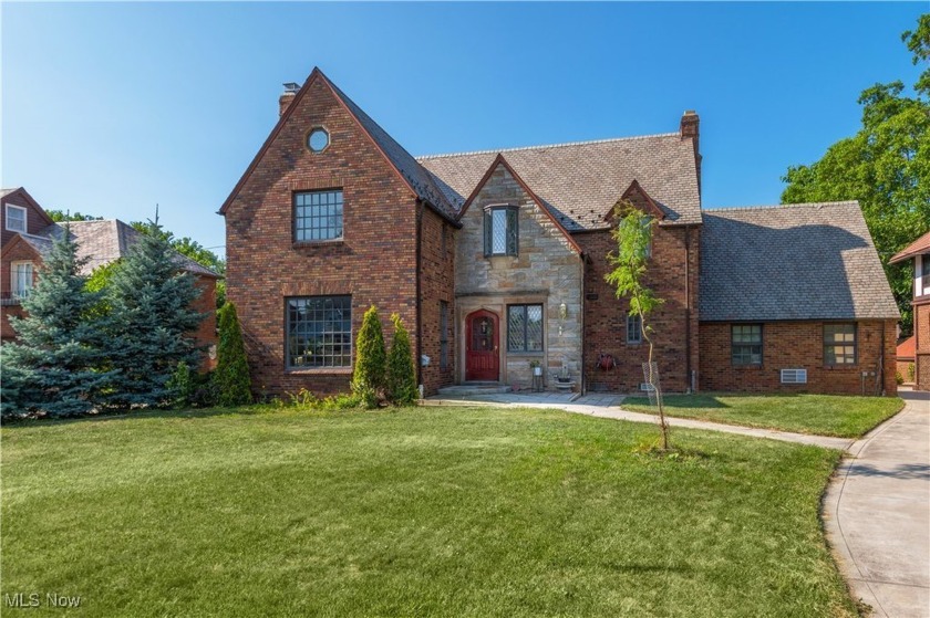 Welcome to 16936 Lake Ave - A Timeless Brick Masterpiece in the - Beach Home for sale in Lakewood, Ohio on Beachhouse.com