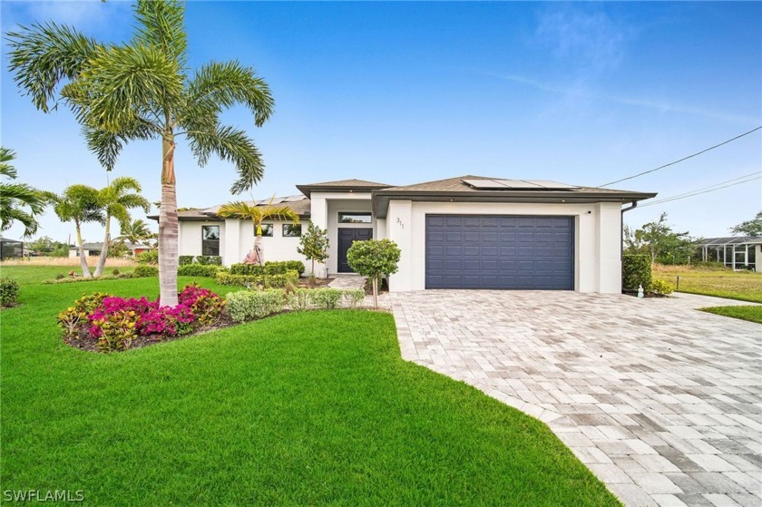 Wake up to breathtaking sunrises in this remarkable waterfront - Beach Home for sale in Cape Coral, Florida on Beachhouse.com