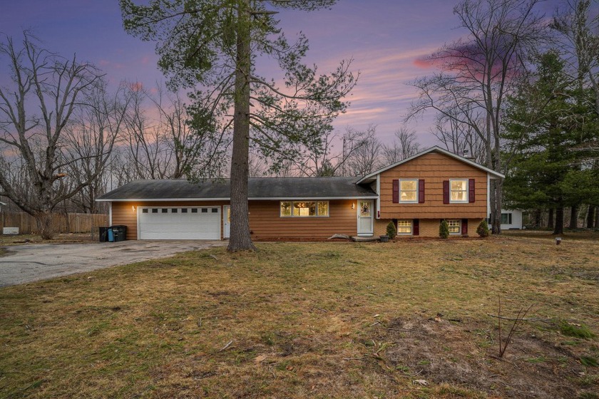 This charming home offers comfort, space, and a great location - Beach Home for sale in Cheboygan, Michigan on Beachhouse.com