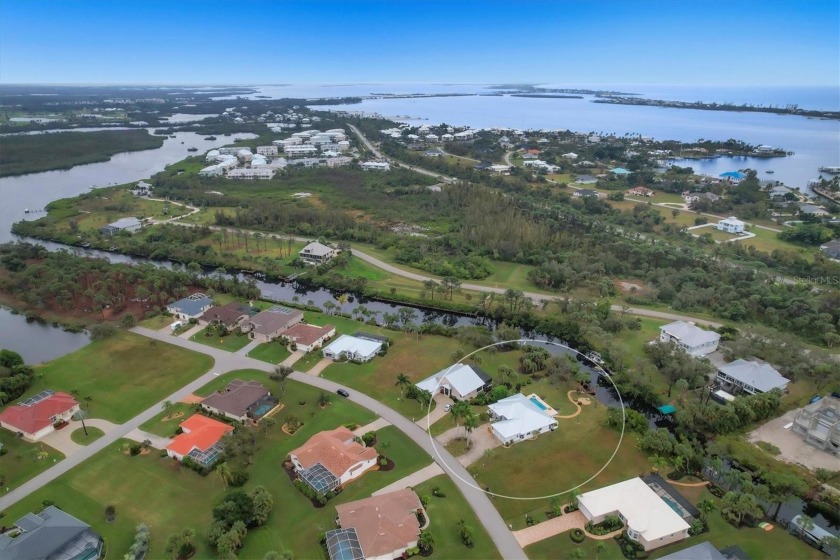 Discover Paradise at its finest nestled upon the Coral Creek - Beach Home for sale in Placida, Florida on Beachhouse.com