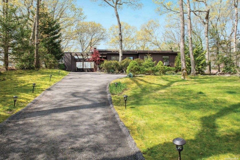 From high atop a hill, this beautiful home has a must-see - Beach Home for sale in Southampton, New York on Beachhouse.com