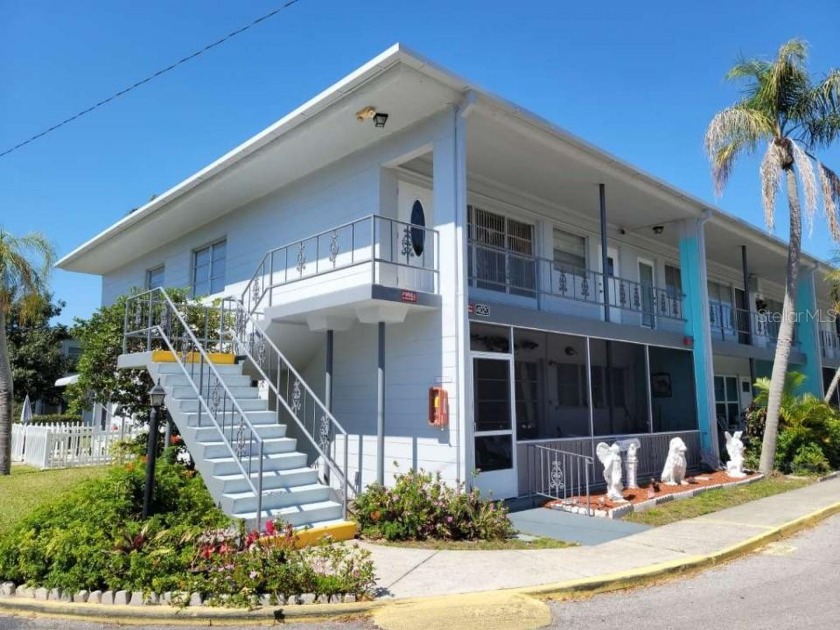 This unit is a TOP (2nd) FLOOR CORNER END UNIT in the far rear - Beach Condo for sale in Kenneth City, Florida on Beachhouse.com