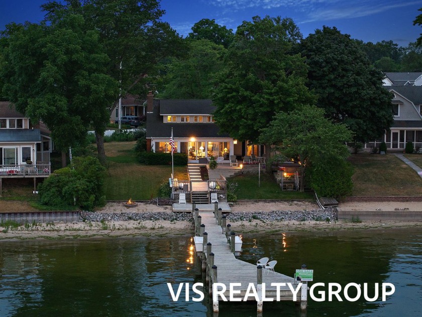 Gas up the boat or jet ski, grab your beach toys, and get that - Beach Home for sale in Spring Lake, Michigan on Beachhouse.com