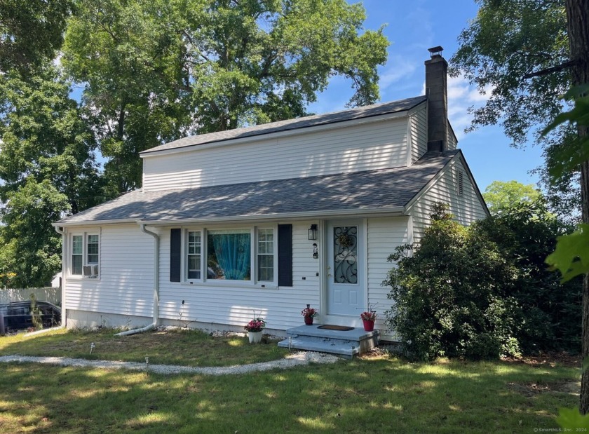 Absolutely charming and move-in ready, this beautifully - Beach Home for sale in Clinton, Connecticut on Beachhouse.com