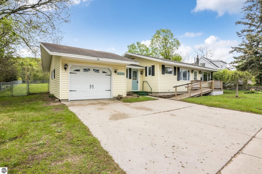 Something special awaits with this welcoming ranch-style home - Beach Home for sale in Maple City, Michigan on Beachhouse.com