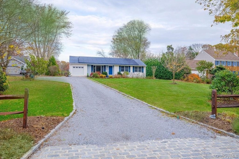 Move right in to this beautifully updated ranch set on a private - Beach Home for sale in Laurel, New York on Beachhouse.com