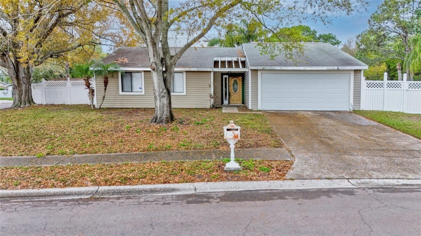 This updated 3 bedroom, 2 bathroom, 2 car garage home is nestled - Beach Home for sale in Oldsmar, Florida on Beachhouse.com